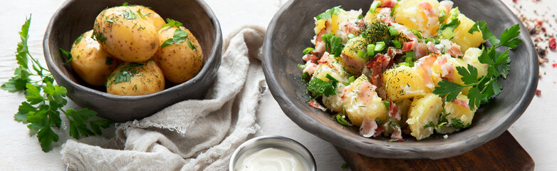 Wall Mural - Kartoffelsalat - traditional German potato salad. Potato salad with bacon.