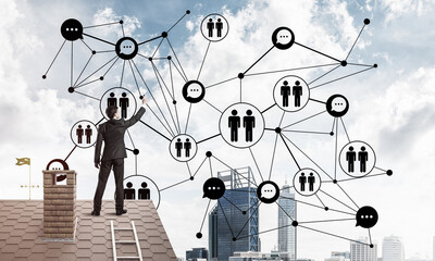 businessman on house roof presenting networking and connection c