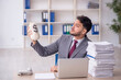 © Elnur - Young male employee in remuneration concept
