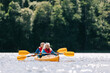© Photocreo Bednarek - Happy senior active couple kayaking on lake