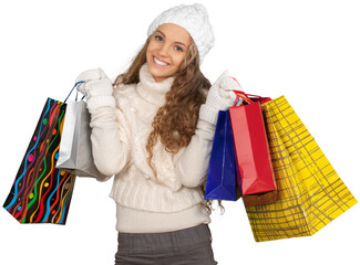 Wall Mural - Young Woman In Winter Clothes Holding Presents - Isolated