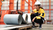 © Nassorn - Latin engineer wears safety helmet work in heavy metal engineering factory. Young female hispanic worker in hardhat hard hat checking production machinery equipment in metalwork manufacturing facility