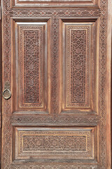 Wall Mural - Carved wooden doors with patterns and mosaics.