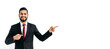 © Kateryna - Panoramic photo of friendly positive indian or arabian businessman in a business suit, stand on isolated white background, pointing fingers to the side, looking at camera, smiling happily. Copy-space