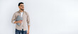 © Kateryna - Copy-space. Panoramic photo of happy arabian or indian bearded man, in casual shirt, standing on isolated white background, holding laptop, looking to the side, smiling joyfully, dreaming, thinking