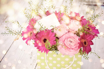 Wall Mural - Beautiful bouquet of flowers background with bokeh lights - Floral greeting card for Mothers Day, Wedding , Birthday Event 