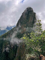 Sticker - Landscape of the stunning mountains of Machu Picchu covered in the fog in Peru