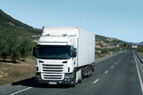 Fototapeta  - Truck on a highway - front view