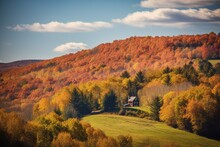 Fall Foliage Across The Rolling Hills Of Vermont. Peak Fall Color On A Beautiful Sunny Day In New England. Generative AI