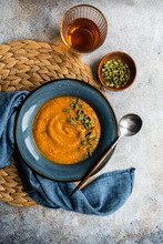 Tasty Pumpkin Cream Soup In Blue Vintage Ceramic Bowl