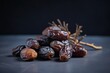  a pile of raisins sitting on top of a table next to a stick of dry leaves and a stick of dry leaves on top of the table.  generative ai