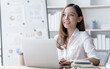 © NanSan - Confident Asian businesswoman calculating finances in the accounting and balance sheet work of the stock market and international exchange rates, Authorized Share Capital, Owners Equity, Common Stock