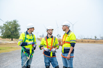 Wall Mural - Wind turbine engineer,Engineer maintains and controls wind turbine energy generation on wind turbine farm,Concept of sustainable future.