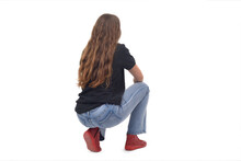 Back And Side  View Of A Young Girl Long-haired Sitting Squatting On White Background