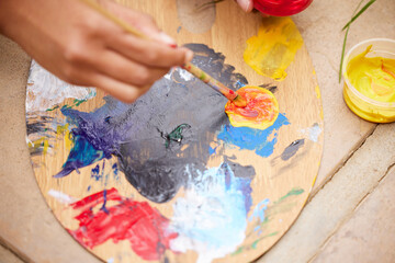 Canvas Print - Craft makes our homes more human. s unrecognizable woman painting a pot in the garden at home.