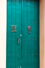 Exploring the colors, architecture and culture of the old and classic colonial houses of Cartagena, with their red, yellow, green, blue and white colored doors and traditional elements of Cartagena Co