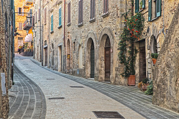 Naklejka na meble Italy, Umbria. Street leading up to the main square in the historic town of Montone.