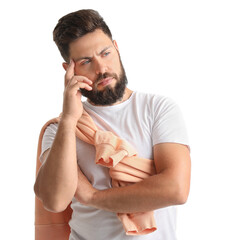 Canvas Print - Thoughtful young bearded man on white background