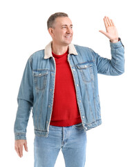 Canvas Print - Mature man waving hand on white background. Hello concept