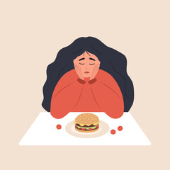 eating disorder. sad woman looks at hamburger and worries about being overweight. overeating, bulimi