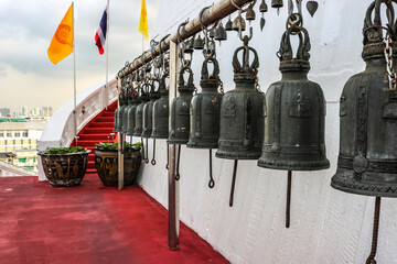 Wall Mural - Temple Buddhist bells in on the grounds of Golden Mount Temple (Wat Saket). Bangkok, Thailand. Soft selective focus.