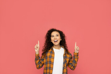 Wall Mural - Young woman in casual wearing on pink background