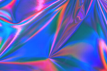 Abstract holographic background 80s, 90s, 2000s style. Modern bright neon purple, blue, orange, pink metallic psychedelic optimistic holographic foil texture. New wave, psychedelic retro futurism