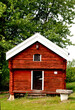 Old wooden red  cottage in dalecarlia in Sweden
