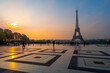 Eiffel Tower, French: Tour Eiffel, silhouette at dawn. View from Trocadero Square with geometrical marble pavement. Paris, France