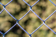 Iron mesh on the fence close-up.