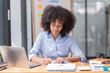 © Tj - portrait of Beautiful Asian African businesswoman with smiling working in the office.