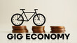 Gig economy is shown using the text and picture of bicycle