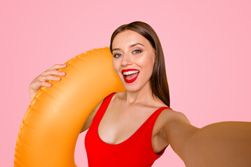 Poster - Closeup photo portrait of beautiful pretty lovely nice cute charming lady with open mouth making taking selfie holding lifebuoy isolated vivid background