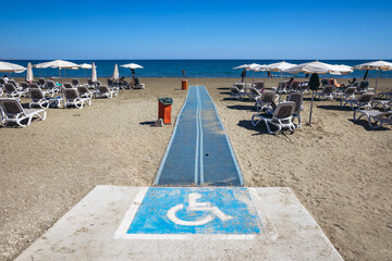 Wall Mural - Disabled access point on a beach called Mackenzie in Larnaca, Cyprus