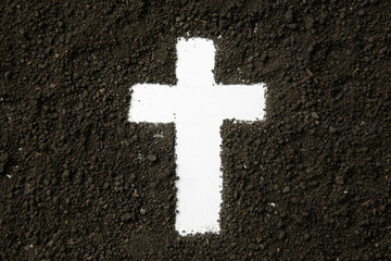 Wall Mural - top view of white cross shape with dark soil grim reaper funeral death