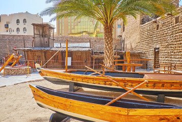 Wall Mural - The vintage fishing boats and primitive house example in Al Fahidi Fort, Dubai, UAE