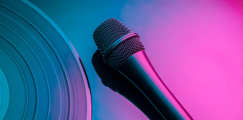 musical abstract background with vinyl record and microphone