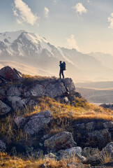 hiker with big backpack in the mountains