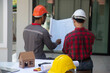 © weerachai - Engineering team consulting and analyzing building projects construction site .Home concept Offer Management