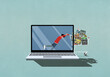 © fStop - Boy online shopping, pushing shopping cart of toys on laptop screen