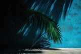 Fototapeta Do akwarium - Empty palm tree silhouette, cement wall surface on a blue background