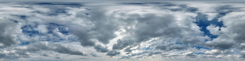 Wall Mural - overcast blue sky with cumulus clouds as seamless hdri 360 panorama with zenith in spherical equirec