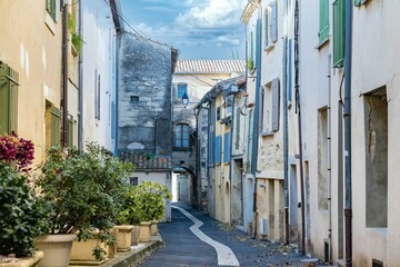 Sticker - A beautiful shot of an alley with historic buildings in Uzes, France