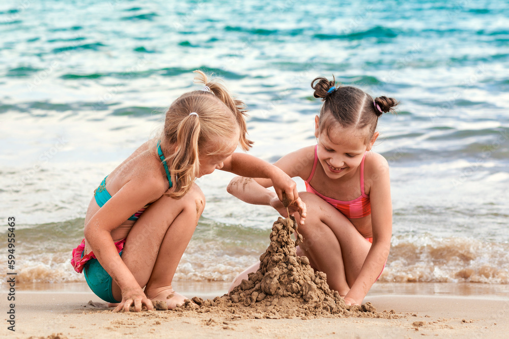 Sea Summer Fun Vacation. Happy Children building Sand castle, Playing ...