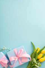 mother's day trendy celebration concept. top view of trendy gift boxes and yellow tulips on pastel b