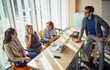 © luckybusiness - Multiethnic group of colleagues having a break