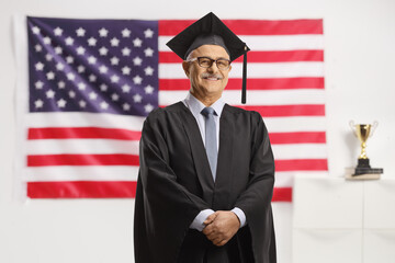 University dean standing in front of USA flag