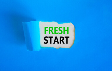 Wall Mural - Fresh start and motivational symbol. Concept words Fresh start on beautiful white paper. Beautiful blue table blue background. Business motivational and Fresh start concept. Copy space.