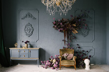 Vintage Chest Of Drawers Decorated With Flowers In The Interior With Stucco On The Wall, Luxury Home Design