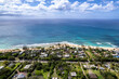 Aerial view of the north shore of Oahu, Hawaii, overlooking Ehukai Beach known for its large winter waves